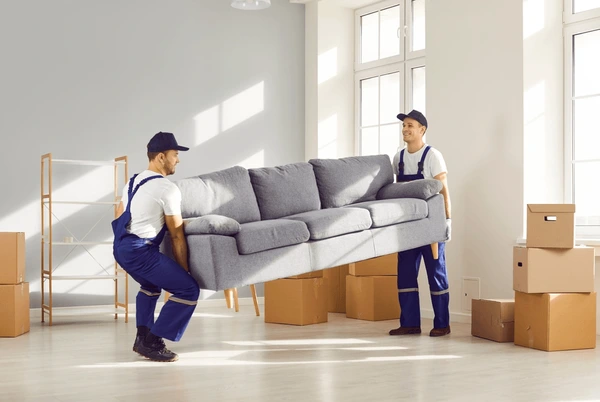 two young moving service employees 600nw 2432457279
